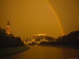 Sunset Light Casts an Orange Glow and a Rainbow over Salzburg