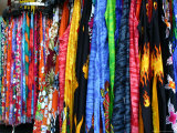 Bright Fabric Racks in an Abstract View at an Outdoor Flea Market