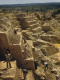 Miners Shovel Material Up Terraces; Others Dig For Quartz Crystals