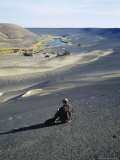 Woman Sits Near the Lake Inside the Waw an Namus Volcano