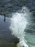 Curacao Island Child Plays in the Surf of the Caribbean Sea