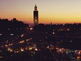 Elevated Twilight View of a Village and Markets