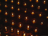 Votive Candles Send the Prayers of the Faithful Towards Heaven