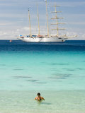 Female Swimmer with Barquentine Star Flyer in Background