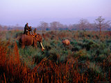 Elephant Carrying Tourists on Safari