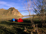 Tourists' Tents Pitched by a Waterway