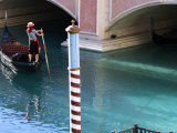 Woman Rowing Gondola in Replica of Venice Canal  Las Vegas