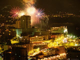 Fireworks Exploding over City Buildings During Summer Celebrations
