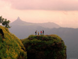 Hikers Standing on Louisa Point in Evening Light