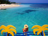 Women Sits over the Water  Praia Do Breezes Hotel