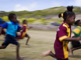 Local School Girls Competing in Race During an Inter-Island School Sports Carnival