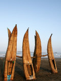 Caballitos De Totora Stacked Vertically in Order to Dry Between Fishing Trips