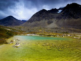 Colorful Lake Surrounded by Mountains in Stortinddalen  Lyngsalpene