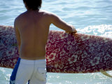 Man with Surfboard at Beach