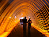 People Walking Through One of the 13 Illuminated Fountains at El Parque De La Reserva