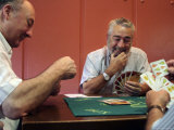 Old Men Playing Traditional Card Game in Bar Next to Fuente De Santa Cecilia