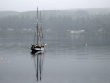 Charter Yacht in Fog  Anchored in Secluded Harbor