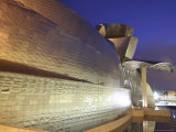 Dusk City Lights Reflect Off Guggenheim Museum