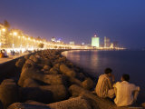 People Relax at the End of Day Along Marine Drive