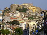 Main Street of Town with Buildings Rising Behind