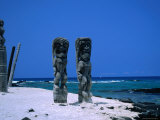 Two Tall Wooden Ki'I Stand Guard Near Hale O Kaewe Heiau at Pu`Uhonua O Honaunau