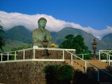 Statue of Buddha Sitting Amongst Mountains and Clouds at the Jodo Mission