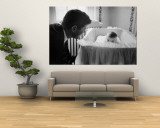Sen Jack Kennedy Admiring Baby Caroline as She Lies in Her Crib in Nursery at Georgetown Home