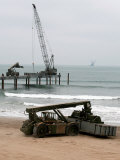 Navy Seabees Dismantling an Elevated Causeway Modular
