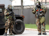 Soldiers Stand Guard at an Intersection During a Bomb Threat