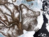 Sea Ice Lines the Shoreline in Eastern Greenland