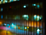 Blurred Image of Office Windows at Night with Illuminating Lights in New York City
