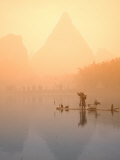 Fisherman on Bamboo Raft in Early Morning Mist  Li River  China
