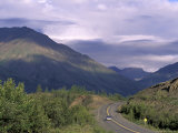 Car Drives on Road near Kluane Lake  Yukon  Canda