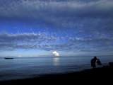 Silhouetted Woman on Lake Tanganyika  Tanzania