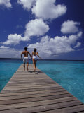 Couple Running on Dock  Curacao  Caribbean