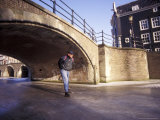 Skater on Frozen Canal  Amsterdam  Netherlands