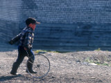 Young Boy Playing on the street of Uelen  Russia's Far East  Siberia
