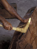 Close-up of Hands Carving Wood for a Canoe  Place of Refuge  Big Island  Hawaii  USA