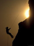 Climber Rapells at Sunset  Turnagain Arm  Alaska  USA
