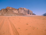 Jeep Tracks Across in Desolate Red Desert of Wadi Rum  Jordan