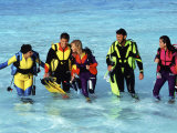 Couples Taking Scuba Diving Lessons in the Caribbean