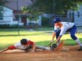 Baseball Player Sliding into Base