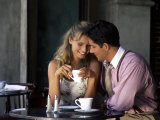 Young Couple Talking in Cafe