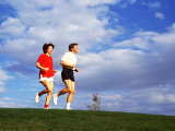 Middle-Aged Couple Jogging Together
