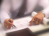 Architect Drawing Blueprints