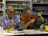 Retired Couple Making Ceramics in Art Class