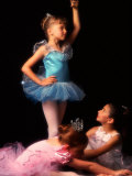 Young Ballerinas Wearing Tutus and Ballet Slippers