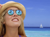 Woman in Caribbean with Palm Trees Reflected in Sunglasses