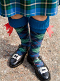 Bagpipe Player at the Loch Ness Area near Drumnadrochit Home  Scottish Highlands