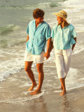 Middle-aged Couple Walking on the Beach